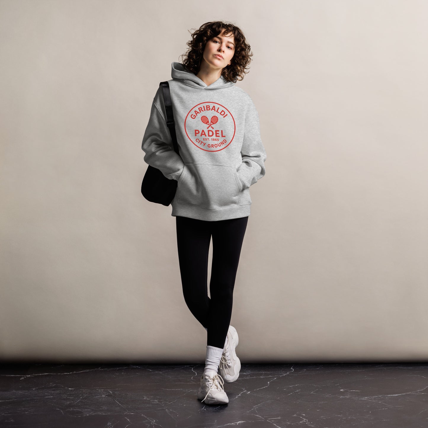 Nottingham padel player wearing Garibaldi Padel Hoody at Nottingham Padel Centre – City Ground inspired